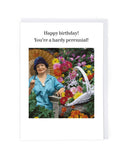 Greeting card with a woman in a colourful and cheerful garden and flowers, featuring text 'Happy birthday! You're a hardy perennial!'.