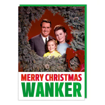 A Christmas card with a 1960s picture of a smiling family looking at camera through a festive wreath. Text below them reads Merry Christmas w*nker.