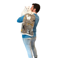 Man holding a white fluffy cat and a People I Love: Cats tea towel by BlueQ