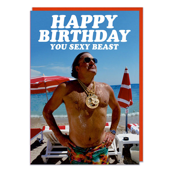 Happy Birthday You Sexy Beast Funny Birthday Card. A birthday card with a picture of an overweight, suntanned man on the beach with a big gold medallion. White text above him reads Happy birthday you sexy beast. 