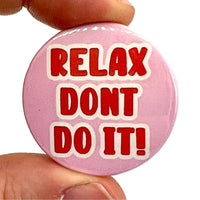 Relax Don't Do It Badge pink with bold red lettering 