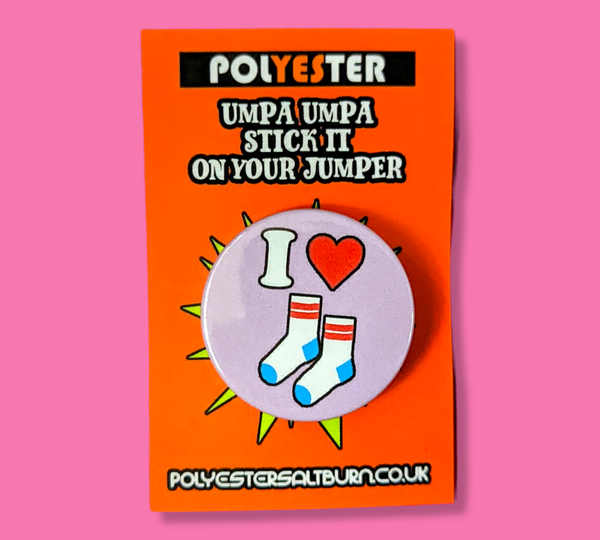 I Love Socks Badge on a brightly coloured backing card 