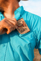 Blazing Saddles soap bar by Outlaw. Image shows a man taking soap from his shirt pocket