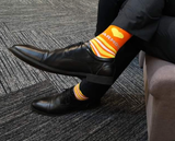 Parmo socks worn with a suit