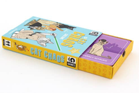 shows Cat Chaos card game from front (slim blue box with cat cartoons on the front) . Box is lying flat and half opened with colourful cat cards visible inside