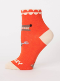Hangry Ankle Socks. Red aocks with white cuffs showing a funny cartoon bear holding a knife and fork. Side view 
