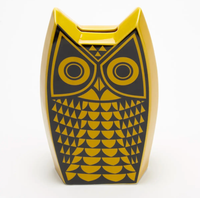 Magpie x Hornsea Owl Moneybox - a ceramic owl shaped yellow money box with an owl design in black 