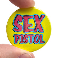 Sex Pistols Punk Inspired Badge yellow background with bold red and blue text